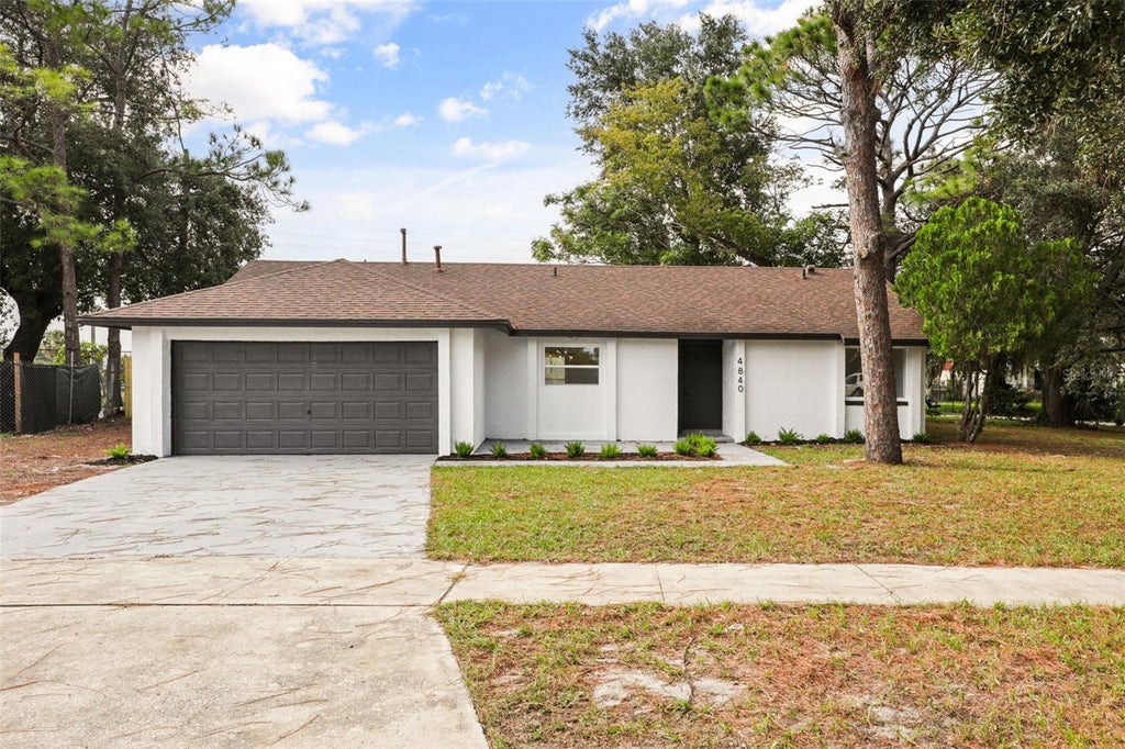 Photo of 4840 Red Willow Avenue, Orlando, FL 32808 (MLS # O6446400)