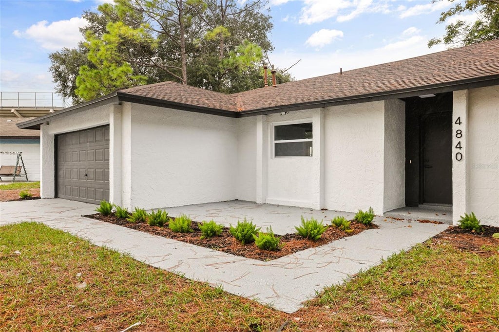 Photo of 4840 Red Willow Avenue, Orlando, FL 32808 (MLS # O6446400)