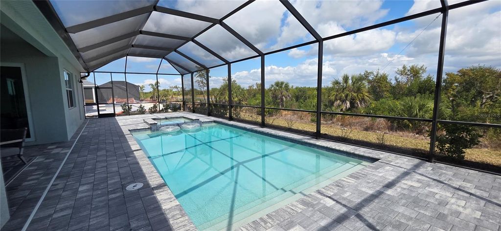 Photo of 8006 Lakes Edge Lane, Port Charlotte, FL 33981 (MLS # A4681950)