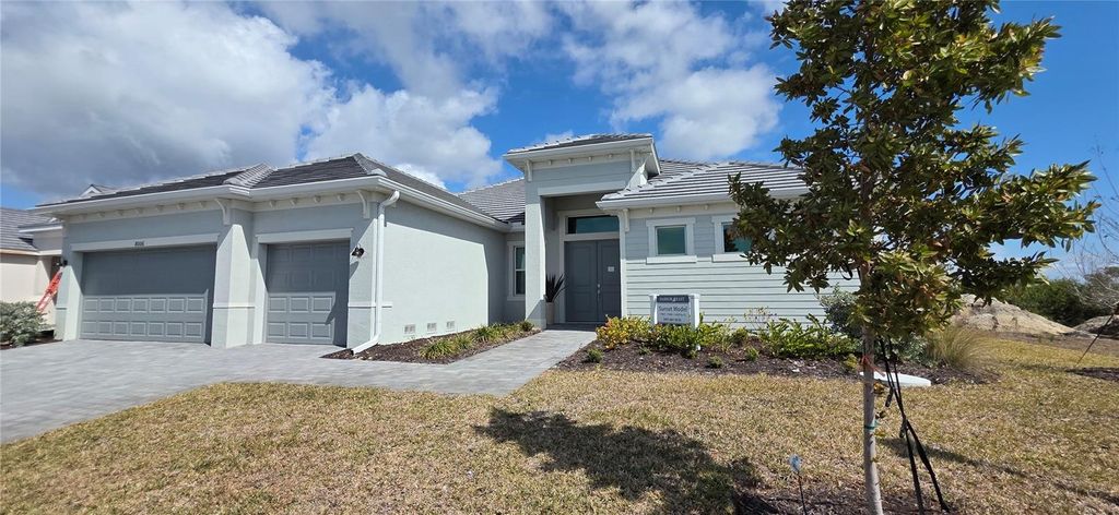 Photo of 8006 Lakes Edge Lane, Port Charlotte, FL 33981 (MLS # A4681950)