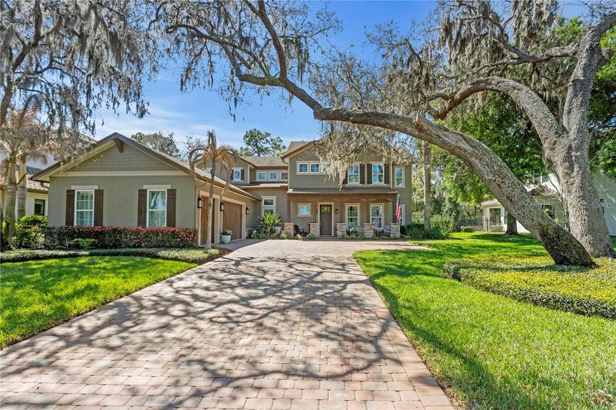 This is the opportunity you have been waiting for. Lovely living as you enter the gates to private luxury and easy access in & out of FishHawk. Arrive & notice the charm of the oversized brick drive to the custom estate, perfectly situated on a premium lot in the prestigious, gated Preserve of FishHawk. A pristine lot with no rear neighbors, this home offers the ultimate privacy, serenity, & sophisticated living. Before you go inside, turn around & pinch yourself while looking at what your front porch view will be. You will spend lots of mornings & evenings counting your blessings while sitting on the porch of your piece of paradise! Every inch of this thoughtfully designed home exudes elegance & craftsmanship. The grand foyer is greeted by soaring dual-level ceilings, bathed in natural light, flowing seamlessly into the open-concept family room. Notice the rich wood inlays in the double-height tray ceilings & a sweeping staircase adorned with intricate wrought-iron balusters. You immediately know when you step inside that someone thought through every detail & you can be the recipient of their dream. The gourmet kitchen is a chef’s dream, seamlessly connecting to the family room & sunroom—creating a luminous, open gathering space ideal for entertaining. A butler’s pantry between the kitchen & dining room ensures effortless hosting. Large rooms, soaring ceilings, open to the kitchen, the pool, sunroom…..it doesn’t get much better. Retreat to the main-level primary suite, a sanctuary of comfort & style, featuring a spa-inspired en-suite with dual vanities, makeup station, expansive walk-in shower, & a colossal L-shaped walk-in closet with custom organization. Everyday will be a vacation when you wake up with your amazing pool view overlooking the preserve. You will live the good life starting from early mornings to late nights. This floor-plan was customized to give this family what everyone wants, a true 5-bedroom home, with a second downstairs suite. Upstairs, 3 additional bedrooms each include spacious walk-in closets. Two share a Jack-and-Jill bath, while the fourth enjoys a private en-suite. A massive bonus room with a custom barn door & its own walk-in closet provides endless possibilities for a media room, playroom, or home office, complemented by a nearby powder room. Step outside to a resort-style backyard oasis. Entertain in style on the updated travertine lanai, with a heated saltwater pool & spa, natural gas fireplace, & fully equipped outdoor kitchen, all set against the tranquil backdrop of the preserve. A fully fenced yard with lush live privacy screening enhances the feeling of seclusion & luxury. Built with sustainability & longevity in mind, this home was certified green at construction, offering energy-efficient living without sacrificing style or comfort. From custom wainscoting & porcelain tile floors to thoughtful storage solutions & designer finishes, every detail is meticulously curated to elevate daily living. This extraordinary home combines timeless elegance, modern functionality, & unparalleled entertainment spaces—truly a masterpiece in one of FishHawk’s most coveted gated communities. Did I mention this is Bevis Elementary & Newsome High School? Don’t forget all the amenities of FishHawk, but Disney & the beach in approx an hour. There is not a better house on the market.