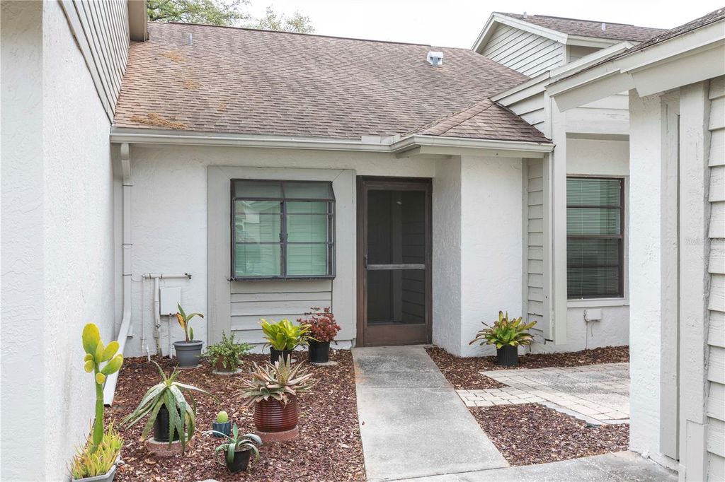 Photo of 11736 Rolling Pine Lane, Port Richey, FL 34668 (MLS # TB8495959)