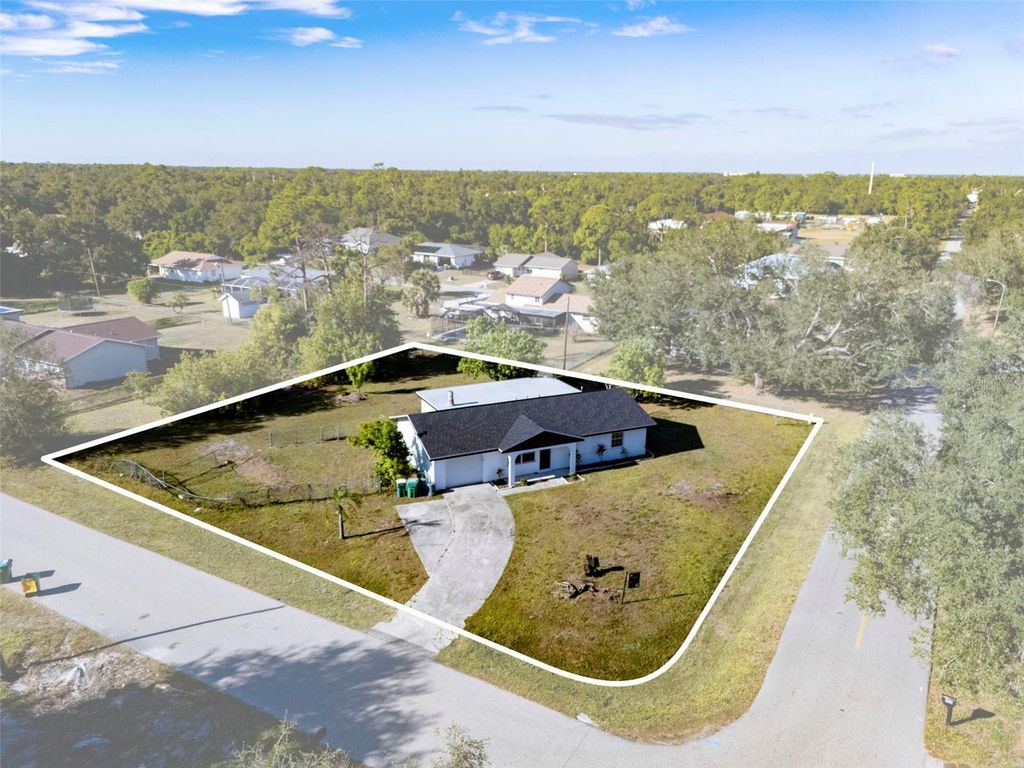 Photo of 1100 Belkton Avenue, Port Charlotte, FL 33948 (MLS # TB8472432)