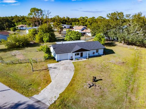 Photo of 1100 Belkton Avenue, Port Charlotte, FL 33948 (MLS # TB8472432)