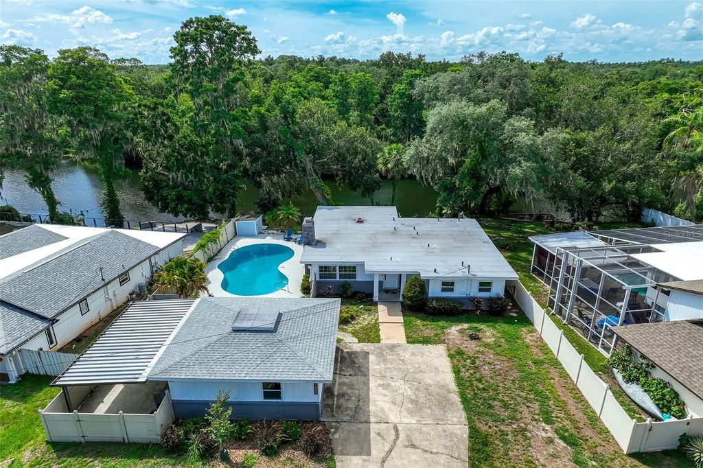 Photo of 11935 Riverhills Drive, Temple Terrace, FL 33617 (MLS # TB8519795)