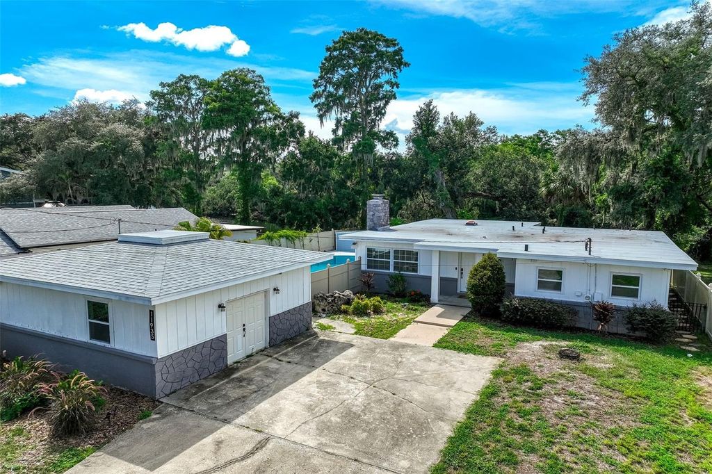 Photo of 11935 Riverhills Drive, Temple Terrace, FL 33617 (MLS # TB8519795)