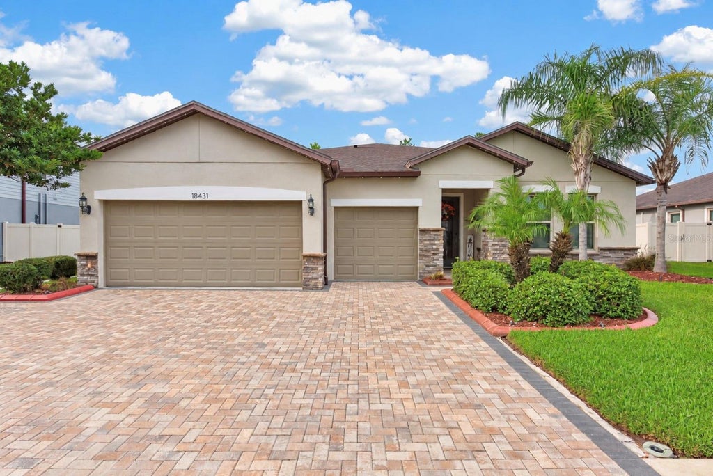Photo of 18431 Cortes Creek Boulevard, Spring Hill, FL 34610 (MLS # TB8557354)