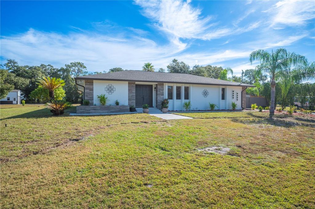 Photo of 5614 Lazy Creek Drive, Lakeland, FL 33811 (MLS # L4957579)