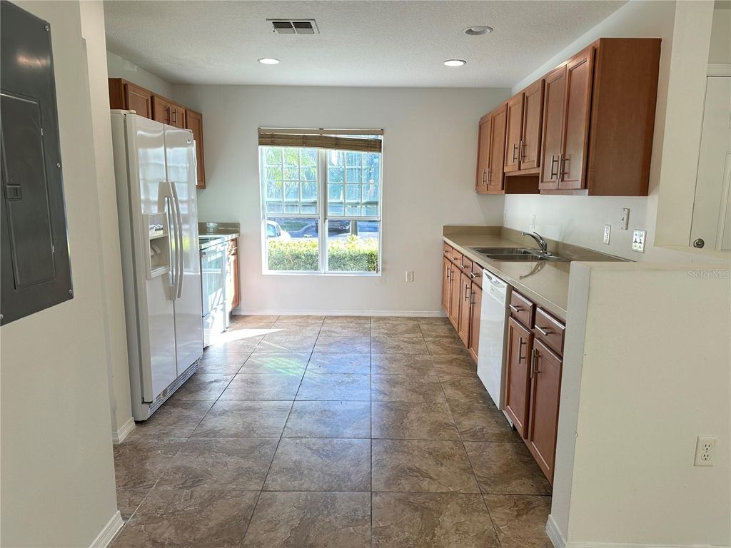 Photo of 5113 Dominica Drive, Kissimmee, FL 34746 (MLS # O6394945)