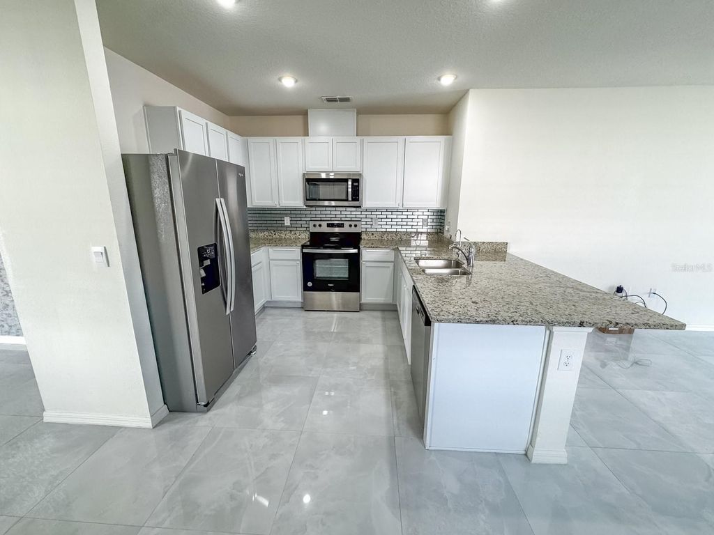 Photo of 4855 Cranberry Way, Lakeland, FL 33811 (MLS # S5133933)