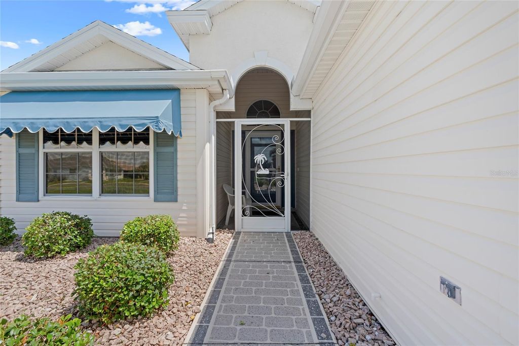 Photo of 1936 Palo Alto Avenue, Lady Lake, FL 32159 (MLS # OM723138)