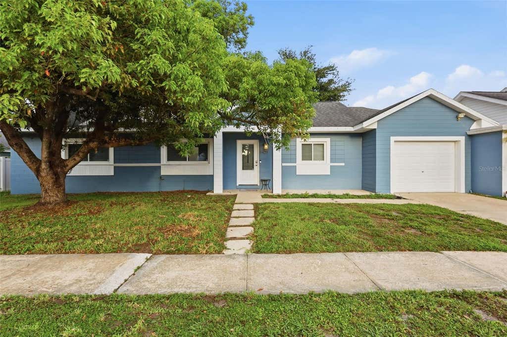 Photo of 8405 Oak Bluff Drive, Orlando, FL 32827 (MLS # O6436832)