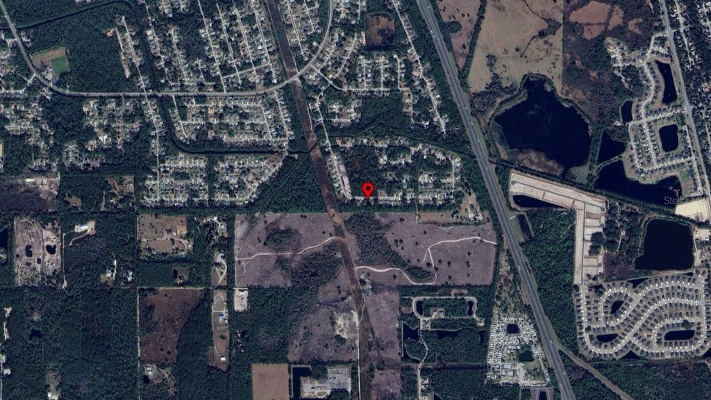 Photo of 60 Secretary Trail, Palm Coast, FL 32164 (MLS # O6418424)