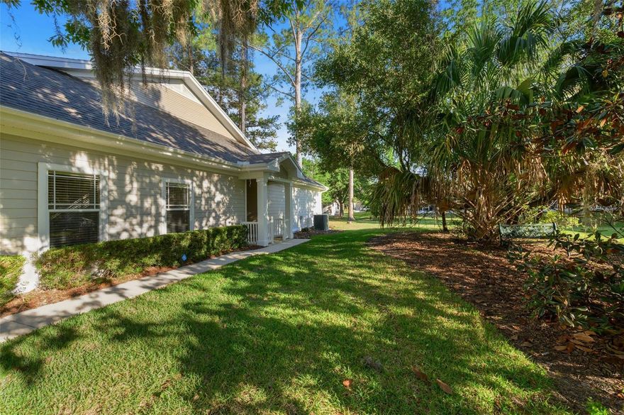 Welcome to this beautifully maintained end-unit villa in the highly desirable Villas of West End community! Offering one of the largest 3-bedroom floor plans in the neighborhood, this pristine single-story home combines comfort, convenience, and an unbeatable location.
Step inside to find spacious living areas filled with natural light, a thoughtfully designed split floor plan, and a kitchen featuring stainless steel appliances, ample cabinetry, and bar seating at the counter—perfect for casual dining and entertaining. The private primary suite is tucked away at the back of the home, creating a peaceful retreat complete with a large bedroom and a luxurious en-suite bathroom featuring a separate garden tub and walk-in shower. At the front of the home, you’ll find two additional bedrooms and a full bathroom, offering ideal separation and privacy for guests or family members. French doors open to a sun-drenched enclosed sunroom with endless possibilities—ideal for a home office, fitness room, reading lounge, hobby space, or additional entertaining area. As an end unit with a private entrance, this home also offers added privacy and peaceful views, backing directly to a beautiful green space. Major updates include a 2024 roof and 2024 HVAC system, offering peace of mind for years to come. The home is also serviced by Clay Electric Cooperative utilities, a highly desirable benefit known for helping homeowners save on monthly utility costs. Conveniently located directly across from the community pool, clubhouse, pickleball and tennis courts, residents enjoy resort-style amenities just steps away. Plus, you’ll love being steps away from Town of Tioga ,shopping, restaurants, grocery stores, parks, walking trails, and a health and fitness center. With a spacious two-car garage, desirable location, and move-in ready condition, this exceptional villa offers the very best of low-maintenance Florida living. **Some photos have been virtually staged. **