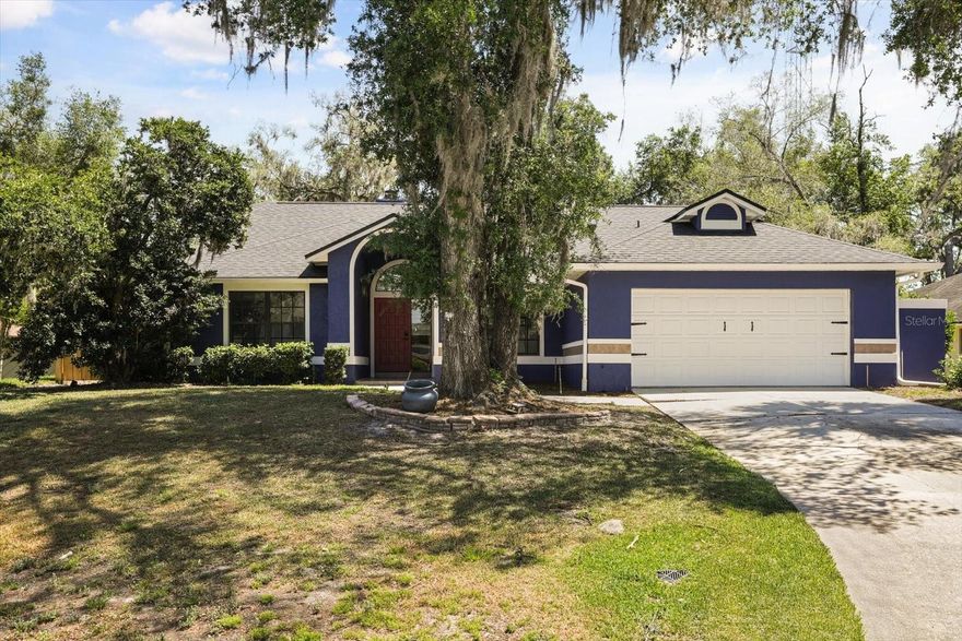 One or more photo(s) has been virtually staged. Welcome to this beautifully updated home in the charming neighborhood of Longwood Green, zoned for the highly rated Lake Mary High School. This property perfectly blends comfort, modern design, and Florida living with its screen-enclosed pool, covered lanai, and fully fenced backyard, creating a private outdoor retreat ideal for relaxation and entertaining.

Inside, you’ll find a completely remodeled kitchen showcasing solid wood, soft-close cabinets, quartz countertops, a stylish tiled backsplash, new sink & faucet, and sleek stainless and black appliances. The kitchen also features a breakfast bar, dinette space, and recessed lighting, making it both functional and inviting. The open living and dining area is warm and welcoming with engineered hardwood flooring, updated lighting and fans, and a brick wood-burning fireplace as the centerpiece. Triple sliding doors lead to the covered lanai and pool area, while skylights and a large fixed window fill the room with natural light.

The split-floor plan provides privacy, with the primary suite located at the back of the home and direct access to the pool. The remodeled primary bathroom impresses with a dual-sink vanity topped with granite counters, a large tiled shower with a glass enclosure, and a luxury automatic toilet. The walk-in closet, lined with aromatic cedar, adds a touch of character and practicality.

Three spacious secondary bedrooms each feature large built-in closets and share a beautiful full bath with a tub/shower combo, newer toilet, wainscoting, and painted cabinets. A sizable hallway closet offers ample storage and there's a door close by with convenient access to the pool area. The inside laundry room has built-in cabinetry, a countertop for folding, and comes complete with washer and dryer.

Additional updates include fresh interior and exterior paint, new lighting and ceiling fans throughout, and a brand-new roof (2024) for peace of mind. This home combines modern updates with timeless charm, all in a well-established community close to parks, dining, shopping, and top-rated schools. It’s the perfect place to call home.