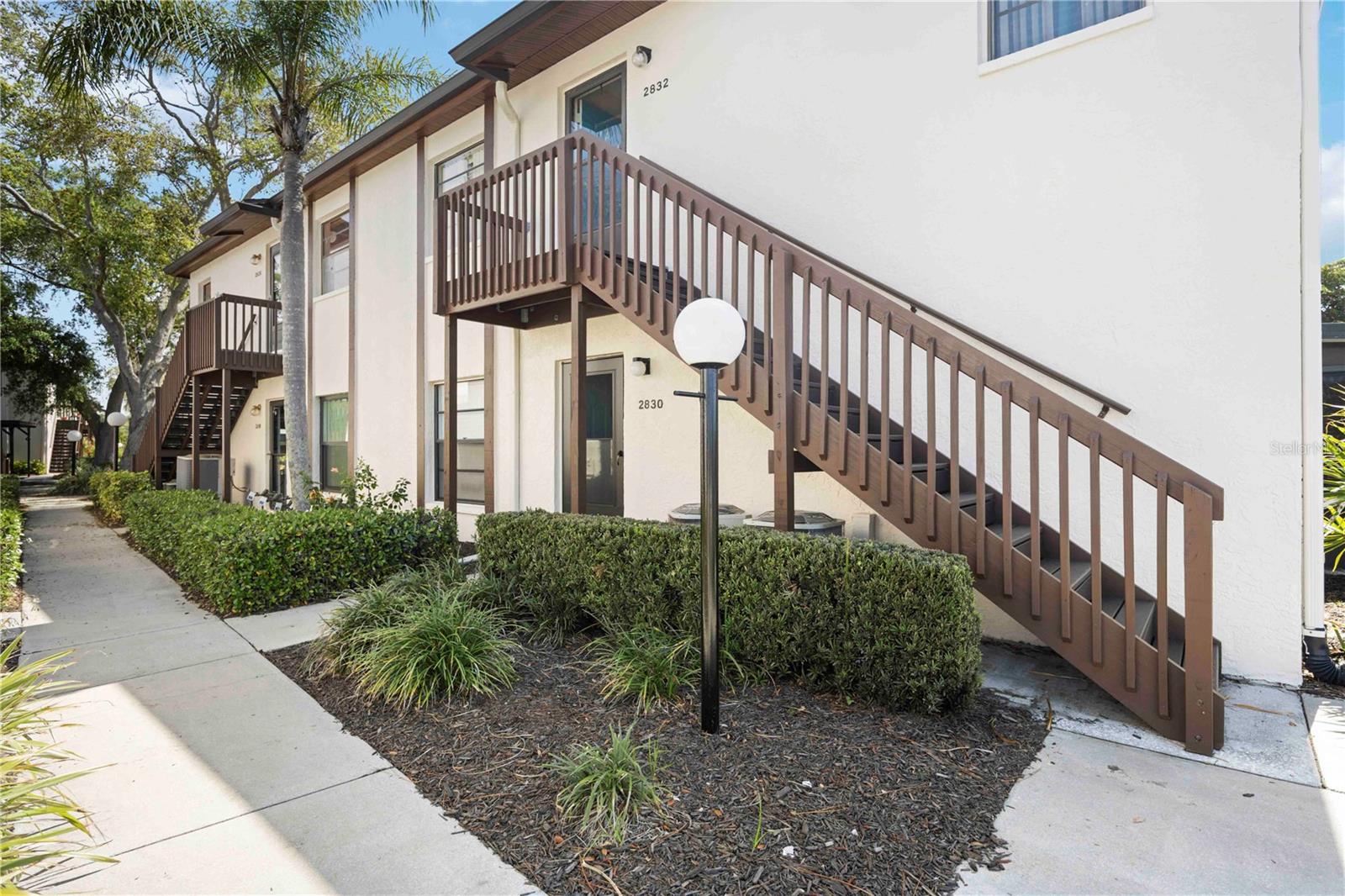 Unlock your Florida dream with this inviting turn-key, 2 bedroom, 2 bathroom condo nestled in the tranquil 55+ community of Country Village. Located on the second floor of a two-level complex, this residence offers enhanced privacy, security, and stunning views of 2 lakes with beautiful fountains and the gorgeous church bell tower right across the street. Featuring a split floorplan, this condo offers a practical layout ideal for comfortable living. Discover the convenience of an interior laundry area, ensuring effortless household chores. Indulge in the community amenities, including a clubhouse, pool, gym, shuffleboard court, and a serene relaxation area overlooking a peaceful pond. With Anna Maria Island and Sarasota beaches just a stones throw away, endless leisure opportunities await. Additionally, the inclusion of association dues covering cable, internet, sewer, and trash is a fantastic added value, providing you with the convenience and savings from additional expenses. The downtown Bradenton and Sarasota, with vibrant nightlife and cultural activities are also within easy reach! Explore the bustling streets, trendy eateries, and incredible shops that define these vibrant downtown areas. For days in the sun, venture to Anna Maria Island, a picturesque barrier island known for its pristine beaches, charming shops, and delicious seafood restaurants. Located just a short distance away, you can easily spend the day relaxing on the sandy white beaches or stroll along the quaint streets. Travelers will appreciate the proximity to Tampa and Sarasota airports, while the reassurance of being only 2 miles from Blake Hospital adds peace of mind. Experience maintenance free living at its finest, allowing you to embrace the Florida lifestyle without hassle. Don't miss out on this affordable and centrally located condo - take this opportunity to make your Florida dream a reality today!