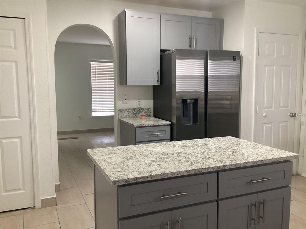 Photo of 974 Derbyshire Drive, Kissimmee, FL 34758 (MLS # S5148767)