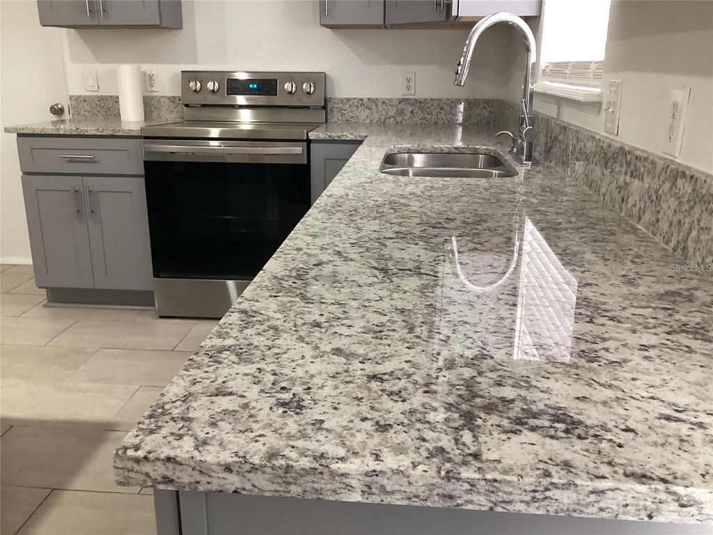 Photo of 974 Derbyshire Drive, Kissimmee, FL 34758 (MLS # S5148767)