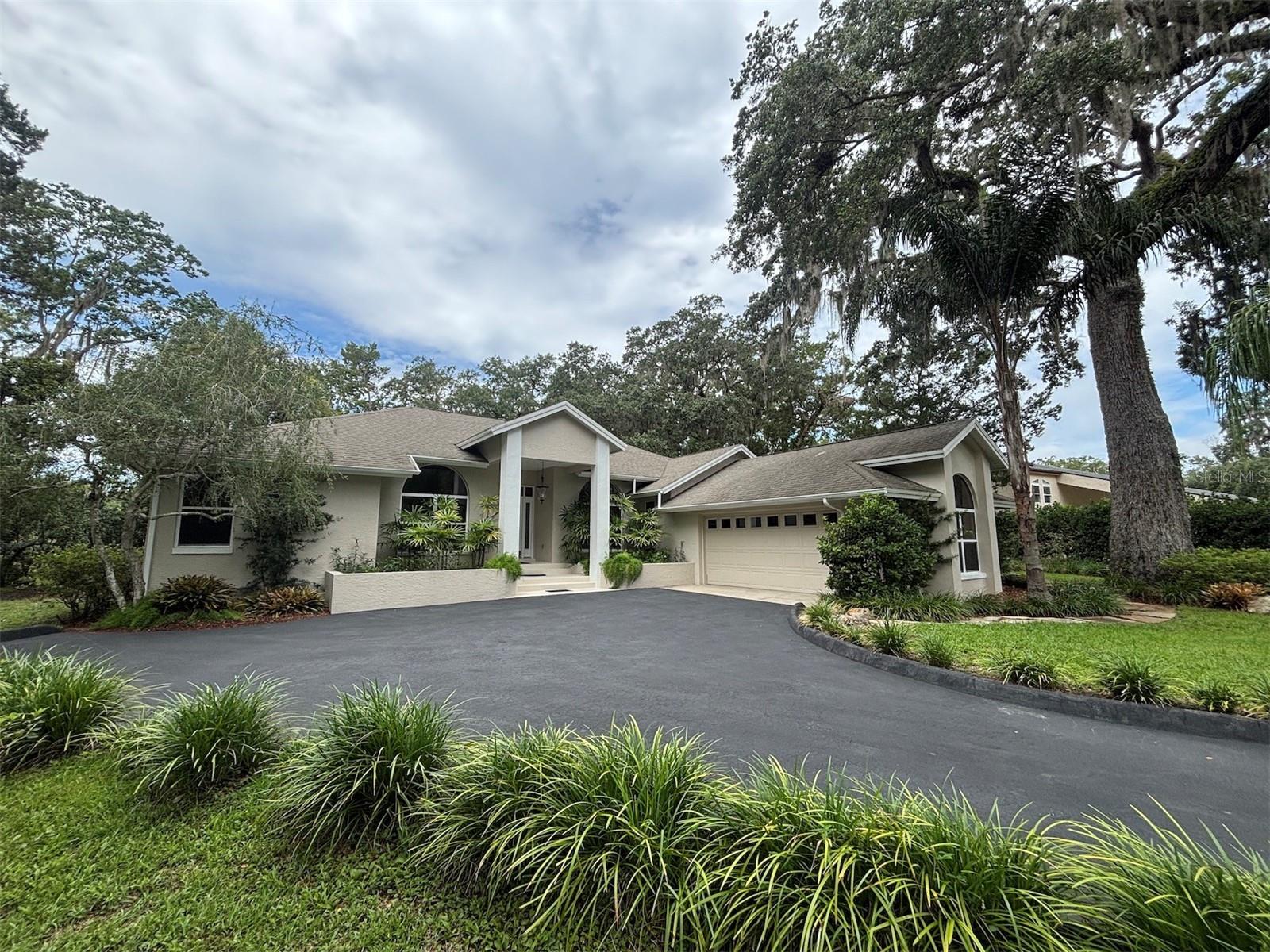 Auction Property. LIST PRICE IS FOR MLS PURPOSES ONLY. ACTUAL PRICE WILL BE DETERMINED AT AUCTION. ONLINE AUCTION ENDS AUG. 19 AT 12 PM ET. Nestled at the end of a private street on nearly an acre (.9± AC) of lush Florida landscape, this waterfront 3BR/3BA pool home is a rare gem, with only 6 homes on the street and direct access to the waters of Crystal River. Tucked along the quiet, freshwater inlet of Kings Bay, this home isn’t just on the water, it is immersed in nature. Surrounded by protected state lands and just minutes by kayak to the iconic Three Sisters Springs and Kings Bay, the home is perfectly positioned for serene living and outdoor adventure. Crystal River, known for its remarkable fishing, manatee spotting and scalloping, is accessible right from your own back yard. Inside, the spacious split floor plan offers soaring cathedral ceilings, skylights, and large multiple French doors that illuminates the space with natural light and frame panoramic views of the water, pool, and gardens. A gas stove anchors the kitchen, while an oversized two-car garage provides ample space for vehicles, storage, or a workshop. The home was in the early stages of renovation when plans changed, leaving the flooring ready for your custom finishes. The home experienced no flooding during recent hurricanes and is ready for your personal touch—ideal for those looking to create their own Florida dream home. Step outside to discover a world of natural beauty: an atrium-style pool and spa with a wraparound wood deck, a detached sauna and full bath, an entertainers lanai, and a zen-like double custom pond with native crabs and small fish. Whether it’s a sunset by the fire pit, a paddle to spot manatees, or relaxing in the sauna after a swim, this is Florida living at its finest. Property #: DG1483. Bid Online August 12 - 19. 10% Buyer's Premium. Subject to the final bid at the online auction and auction terms.