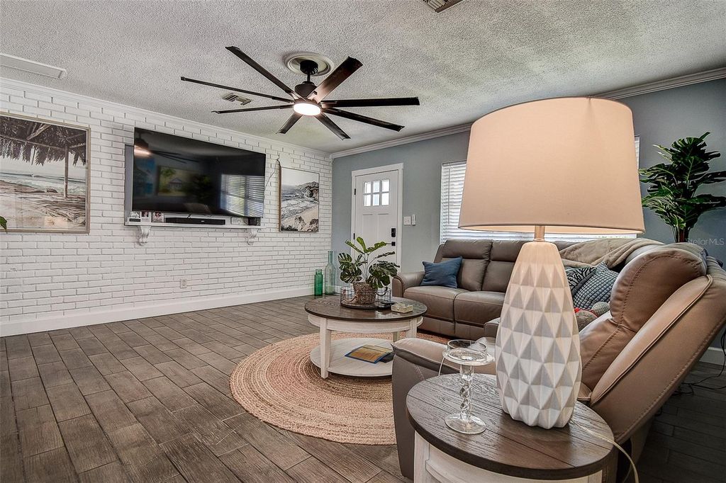 Photo of 725 Sunset Cove, Madeira Beach, FL 33708 (MLS # TB8415202)