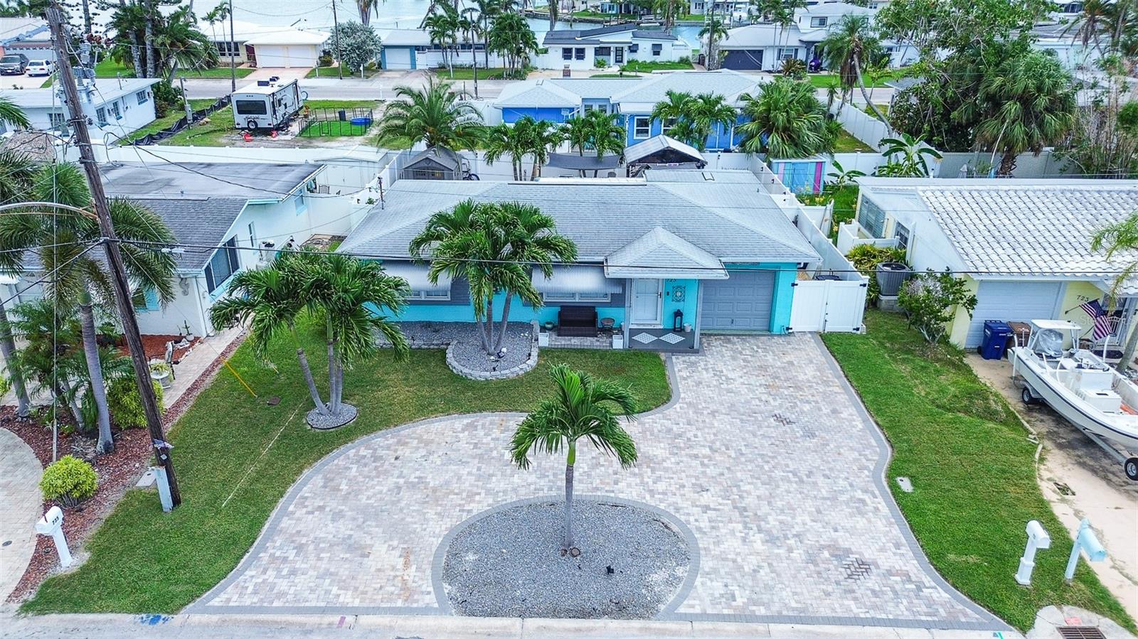Move right in! Beautiful Florida Beach Home. Completely remodeled. What a pretty location. Just a couple houses walk to the private neighborhood waterfront dock and cozy private park with small boat ramp. Sip your morning coffee or enjoy the evening sunsets here-waterside. Watch the dolphins play and maybe even see a group of manatee swim by.
This ia a true 2 bedroom home with a third very large room that could be used for an amazing third bedroom or guest room. The current owner is using it as an office and oversized "department store" style clothes closet! You may fall in love with it too. The home also has a very nice inside laundry/utility room and a one car garage that could fit a small/compact car or fun Deluxe-Beach Golf Cart, kayaks, paddle boards and more. Outside you have a resort style front and back yard. The back yard has an outside shower that is great after a day of boating, swimming at the beach or gardening. Enjoy the extra outside storage and especially the outside Kitchen/grilling entertaing area. Relax and put your face to the sun. Fall asleep reading your favorite book. You can relax in the small yet attractive portable fresh water pool the owner has set up. The home inside has been remodeled with most updates being as new as 2025! The beach home did experience flooding during hurricane Helene but does not have a known history of flooding ( when other beach homes may have) and we think this a terrific benefit and selling point! The home has an attractive modern kitchen with an island sitting area. All appliances will be staying for the new owner. Both bedrooms are a good size with nice window placement allowing the natural sunlight in! The woodwork throughout adds to the character and quality of this home. Look at the doors, door trim, crown molding and baseboards. Notice the high quality and stylish bathroom decor and tile work. The back room would be a nice dining area, library, exercise or hobby/art room. Sunset Cove is a beautiful street with two green space lots. What a nice place to live! Move right in and make this your full time residence...or purchase this home to live in while your new waterfront home is being built! This could be an amazing opportunity as this property is Move In Ready and gorgeous!
Please have the buyer confirm the htd and cooled sq footage. Heated and cooled Sq footage came from Public records. Actual heated and cooled sq footage feels like and may be much larger. Seller says everything has had a permit that they knew of. Buyer to confirm with the City Of Madeira Beach. May this home and beachlife be enjoyed by the new owner as so many others enjoy it here at Madeira Beach. It's a beautiful place to live! Extra parking with the paved circle drive.