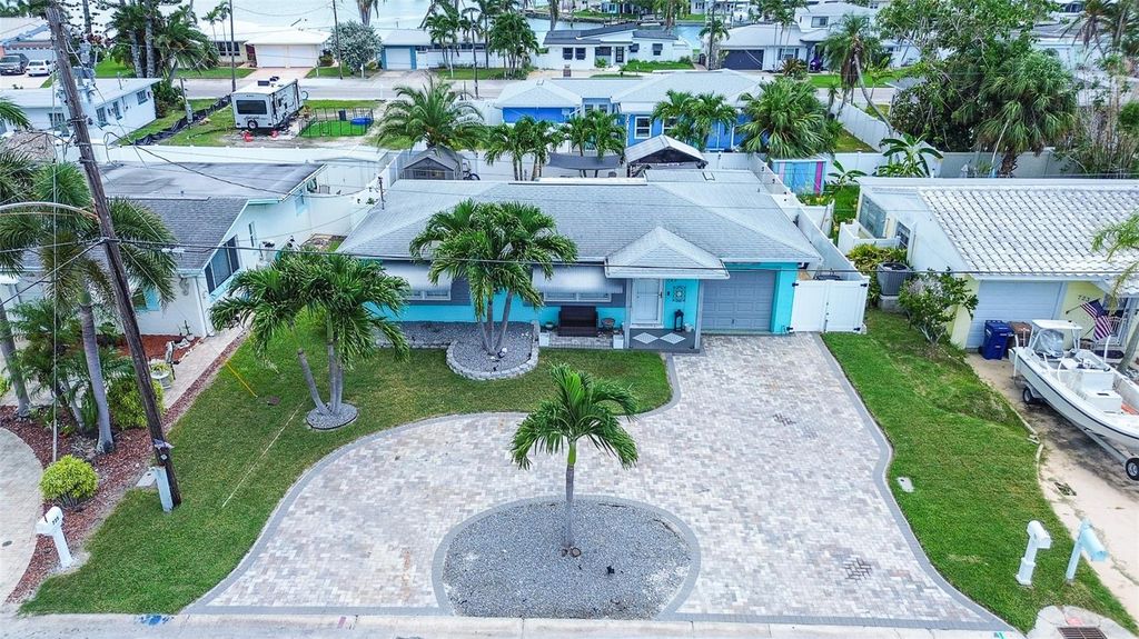 Photo of 725 Sunset Cove, Madeira Beach, FL 33708 (MLS # TB8415202)