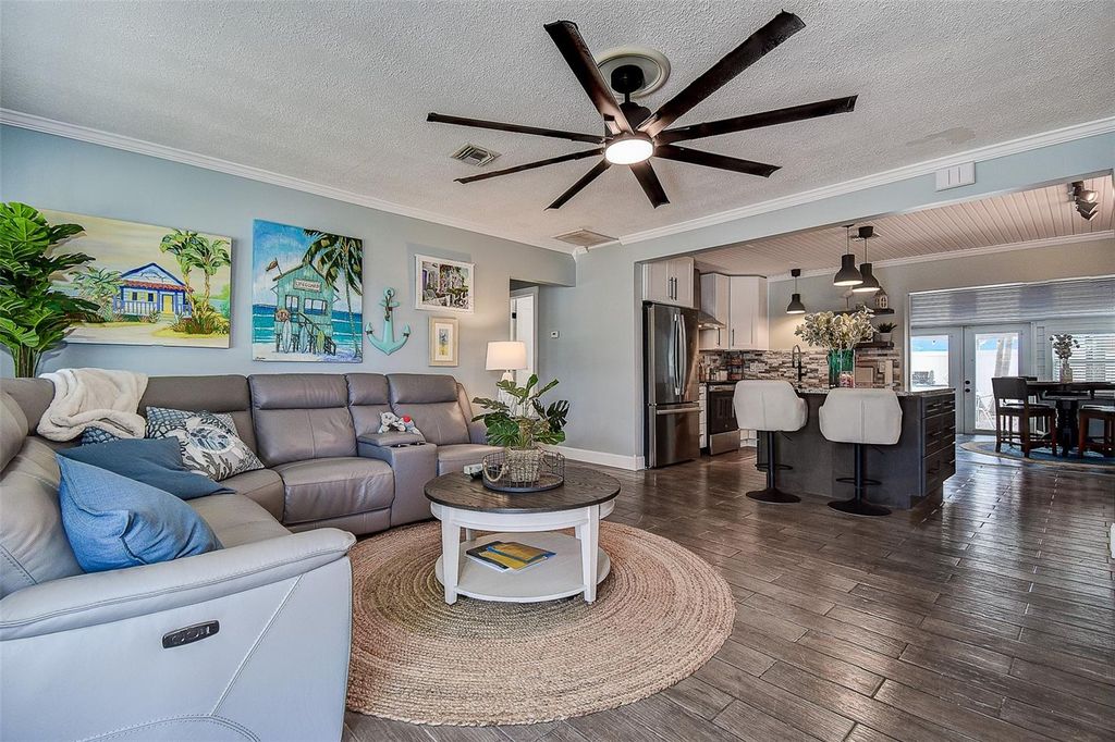 Photo of 725 Sunset Cove, Madeira Beach, FL 33708 (MLS # TB8415202)