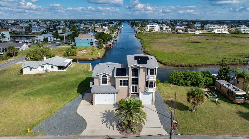 Photo of 3280 Gulf Winds Circle, Hernando Beach, FL 34607 (MLS # TB8439948)
