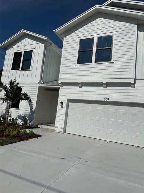 Photo of 809 W Indiana Avenue, Tampa, FL 33603 (MLS # TB8330083)