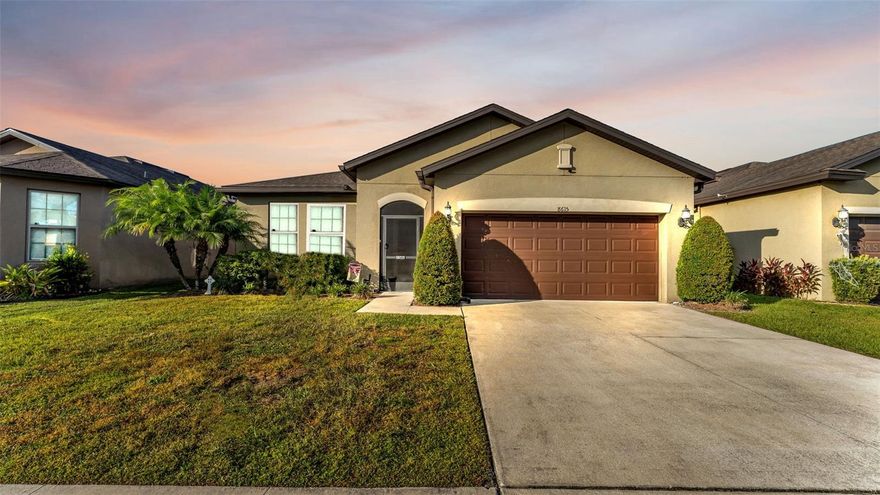 Welcome to 8615 Rindge Rd in beautiful Polk City! This stunning 4-bedroom, 3-bath home offers 1,938 square feet of comfortable living space with an open-concept layout perfect for modern living. The spacious kitchen features stainless steel appliances, ample cabinetry, and a seamless flow into the dining and living areas—ideal for entertaining. Sliding glass doors lead to a relaxing patio and fully fenced backyard with serene pond views, providing the perfect outdoor retreat. The primary suite boasts a walk-in closet and an en suite bathroom with a walk-in shower and double vanity. Additional highlights include ceiling fans throughout, a separate laundry room, and an attached 2-car garage. Conveniently located just minutes from I-4 and State Road 33, this home offers easy access to shopping, dining, and outdoor recreation at Tenoroc Public Use Area. Enjoy being less than 30 miles from Disney and other major Central Florida attractions—don’t miss your opportunity to make this exceptional home yours!