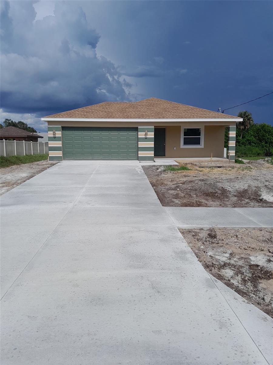 Enjoy peace of mind with brand new construction, plus the freedom of no HOA and CDD fees, giving you flexibility and fewer monthly costs. This 3 bedroom 2 bath home offers, modern comfort and style. The kitchen has granite countertops, pendant lighting, stainless steel appliances, and plenty of cabinet space. The open layout features durable vinyl flooring throughout, making it both stylish and easy to maintain. The spacious master suite includes a walk-in closet for added convenience. This home also features a welcoming front porch perfect to be screened in if desired and a relaxing back porch for added outdoor living space. Conveniently located just 11 minutes from Englewood Beach, Manasota Key and close to local schools. This property combines comfort with an unbeatable location. Don’t miss out on the chance to own this home.