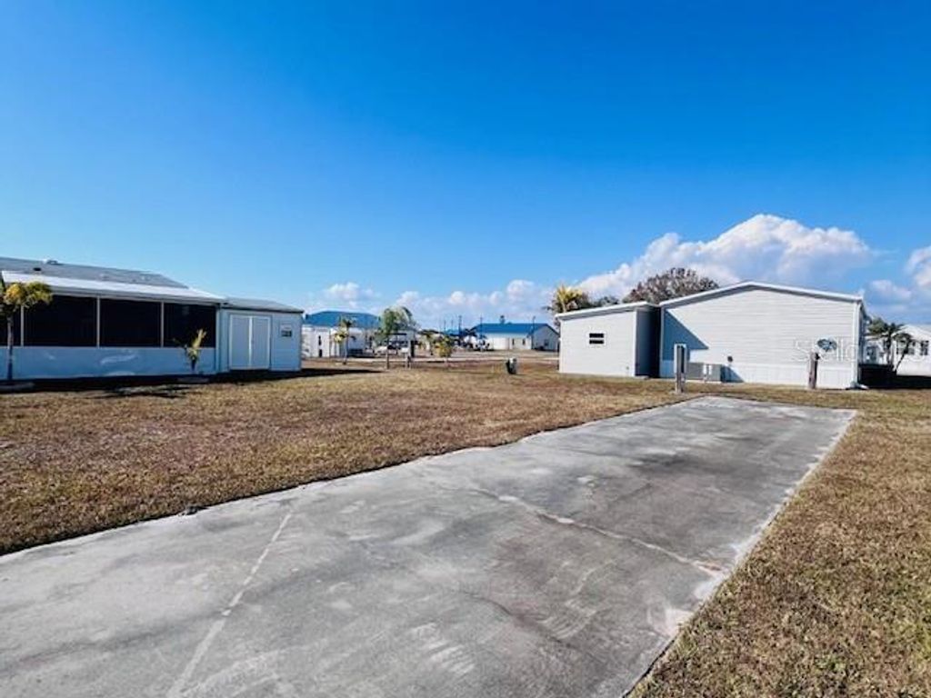 Photo of 161 Tarpon, Punta Gorda, FL 33950 (MLS # C7521890)