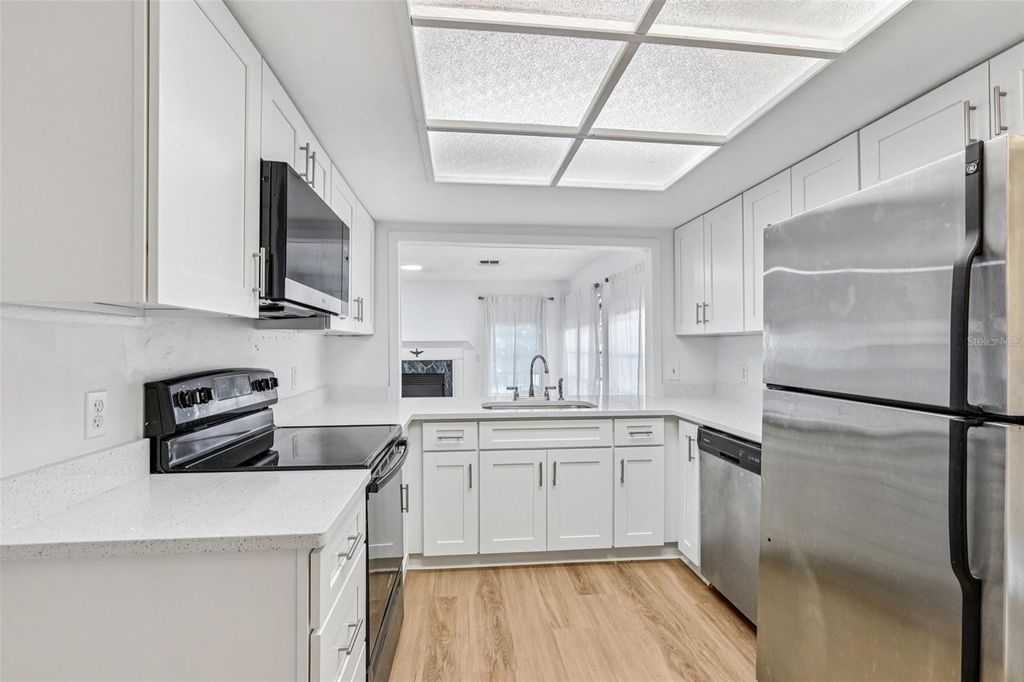 Photo of 11211 Rollingwood Drive, Port Richey, FL 34668 (MLS # TB8440332)