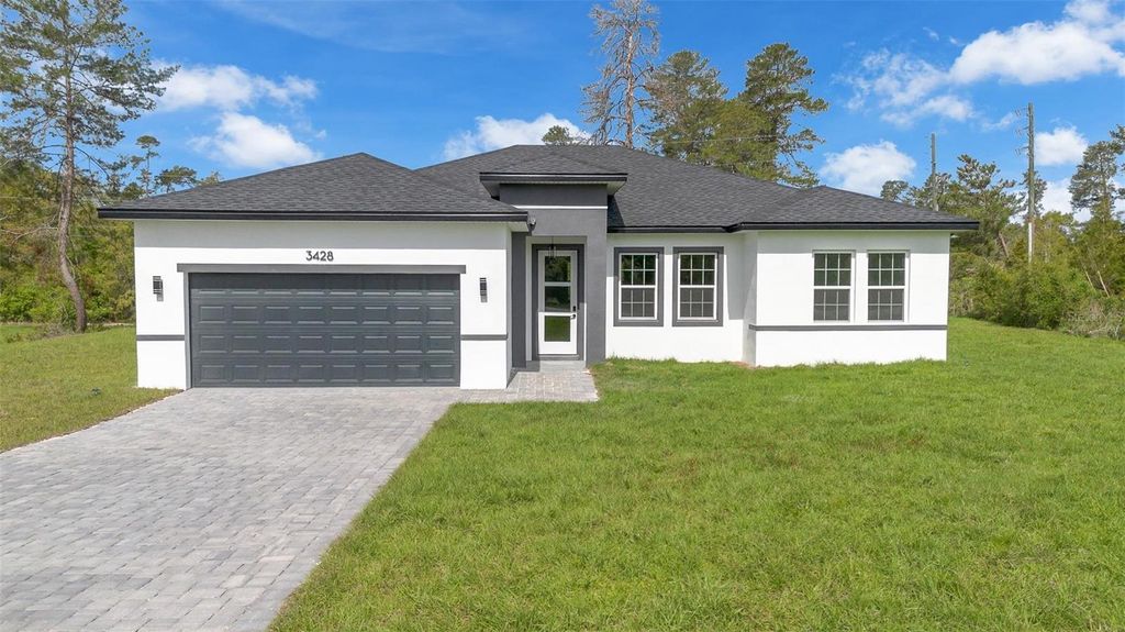 Photo of 3428 SW 165th Loop, Ocala, FL 34473 (MLS # O6399557)