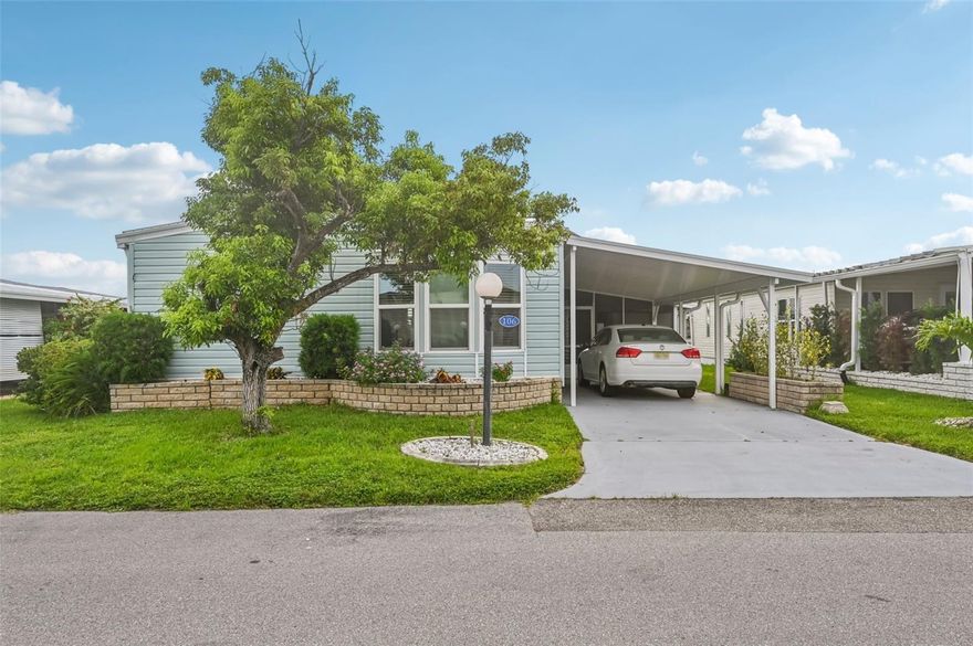Welcome to this spacious 2 bedroom, 2 bathroom canal front manufactured home located in the sought-after boating community of Lazy River Village in North Port, Florida. Perfectly situated on the water with its own private dock, this home is being offered turnkey furnished and is located in the pet section of the community. It features an open floor plan ideal for both entertaining and everyday living. The remodeled kitchen flows seamlessly into the living area, where a long bank of windows frames beautiful canal views and fills the space with natural light. Vaulted ceilings add to the open, airy atmosphere, and new sliding doors lead to a screened-in lanai where you can relax and enjoy the tranquil water view.
The primary suite includes a walk-in closet plus two additional closets for extra storage, while the guest bedroom also offers a walk-in closet and an updated vanity in the guest bath. Recent updates include new windows throughout, a new roof in 2023, a new carport in 2025, a 2019 AC system, and a hot water heater installed in 2023.
Lazy River Village is a premier 55+ community known for its active lifestyle and beautiful waterfront setting. Residents enjoy access to a private marina, boat ramps, kayak launch, heated pool, tennis and pickleball courts, fitness center, and a wide range of social clubs and planned activities. With its friendly atmosphere and stunning natural surroundings, Lazy River Village is the perfect place to enjoy life on the water.