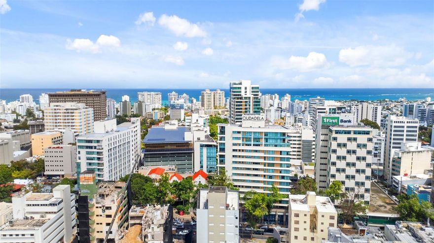 Discover refined urban living in this luxury apartment located in the modern and highly sought-after Ciudadela complex in San Juan, perfectly positioned directly across from the new Parque de Santurce. This vibrant, walkable community offers an unparalleled lifestyle with immediate access to a pet park, 24/7 supermarket, restaurants, pharmacy, banks, theaters, and is just minutes from the beach. The residence features two spacious bedrooms and two full bathrooms and is offered turn-key, fully furnished and equipped, ready for immediate occupancy. Enjoy seamless indoor-outdoor living with a large private terrace, along with the comfort of central air conditioning. The unit also includes two parking spaces, and the building is equipped with a full power generator and water cistern, ensuring convenience and peace of mind. Monthly HOA maintenance is $598, and the annual CRIM property tax is $474.87. This is a rare opportunity to own a residence in one of San Juan’s most dynamic and desirable communities.