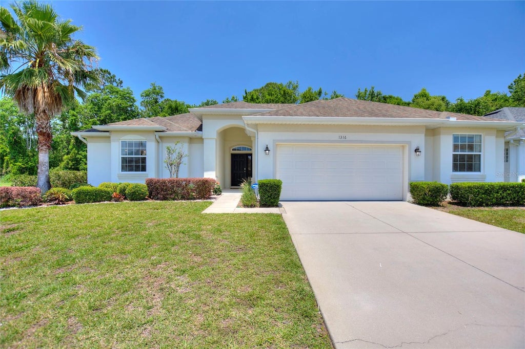 Photo of 1316 Golf Course Parkway, Davenport, FL 33837 (MLS # S5154111)