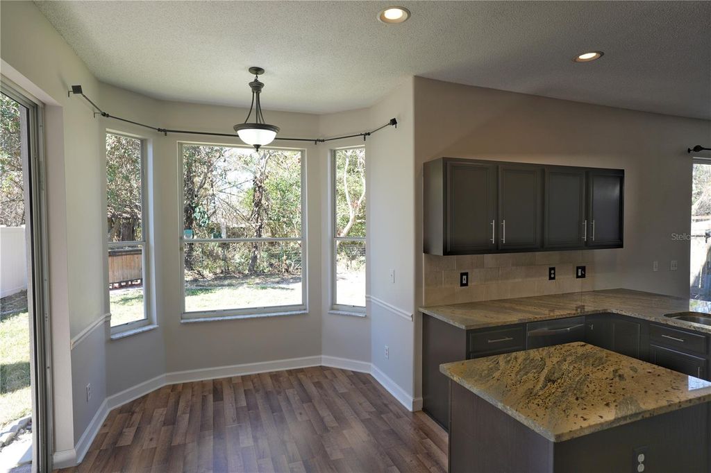 Photo of 832 Magnolia Creek Circle, Orlando, FL 32828 (MLS # O6383249)