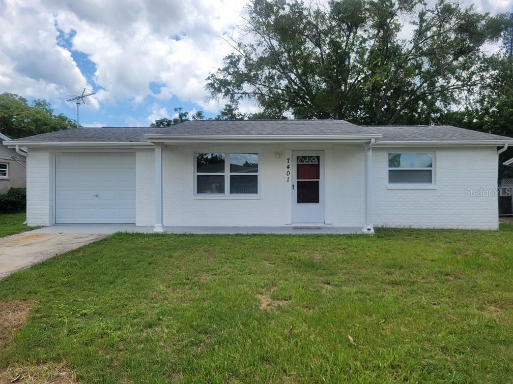 Spacious 2 Bedroom/1 Bath Home in Port Richey!
This home features tile throughout, NO Carpet! Interior has been freshly painted neutral colors. Ample lightening in the living room. Kitchen features stainless steel appliances. A large bonus enclosed porch with an AC wall unit is perfect for entertaining! Fenced in open back yard.
One car garage with washer, dryer, and a bonus garage fridge. The floors in the garage have an epoxy layer for a cleaner look!
Pet Friendly- Breed Restrictions Apply