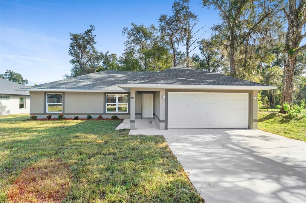 Photo of 415 Ivy Avenue, Deland, FL 32724 (MLS # V4947015)