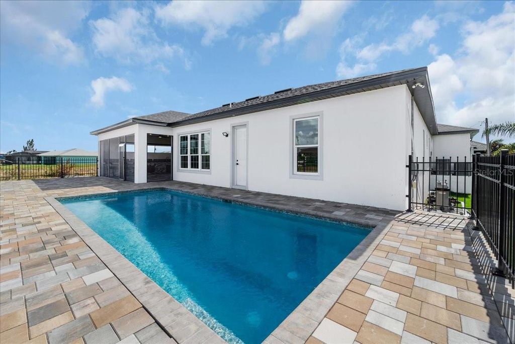 Photo of 15365 Taurus Circle, Port Charlotte, FL 33981 (MLS # C7514406)