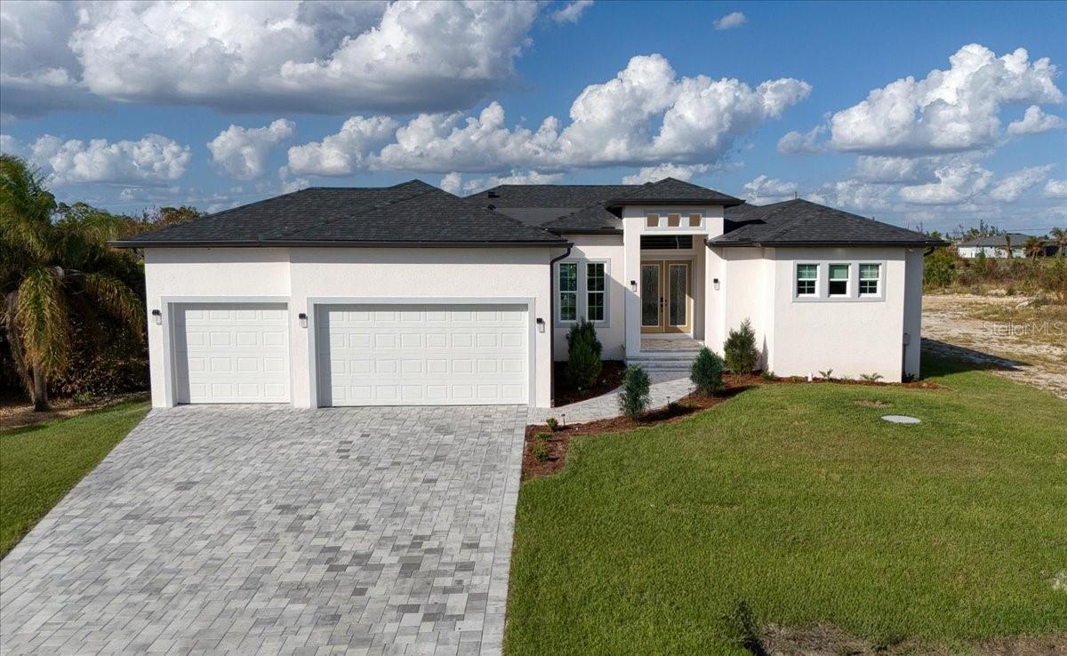 One or more photo(s) has been virtually staged. Experience Florida living at its finest! This NEW custom-built 4 bedroom, 3 bath + DEN home in South Gulf Cove showcases high-end upgrades and a perfect coastal lifestyle. With 2,445 sq. ft. under air, the open concept design boasts soaring ceilings, porcelain tile throughout, impact-resistant windows/doors, and a split floorplan with TWO master suites. The gourmet kitchen offers quartz counters, soft-close cabinetry, stainless appliances, large island, and walk-in pantry. Retreat to the owner’s suite with tray ceiling, SPA-LIKE BATH, and walk-through shower.
Step outside to your private oasis featuring a HEATED saltwater pool, pavered lanai, and built-in OUTDOOR KITCHEN, ideal for entertaining. Additional upgrades include a 3-CAR garage, upgraded lighting, designer finishes, and lush landscaping.
South Gulf Cove is one of the area’s most sought-after waterfront communities with boating access to Charlotte Harbor and the Gulf, minutes from world-class fishing, beaches, golf, dining, and shopping. Optional HOA, public water/sewer, and growing new construction make this an incredible opportunity to own your slice of paradise.