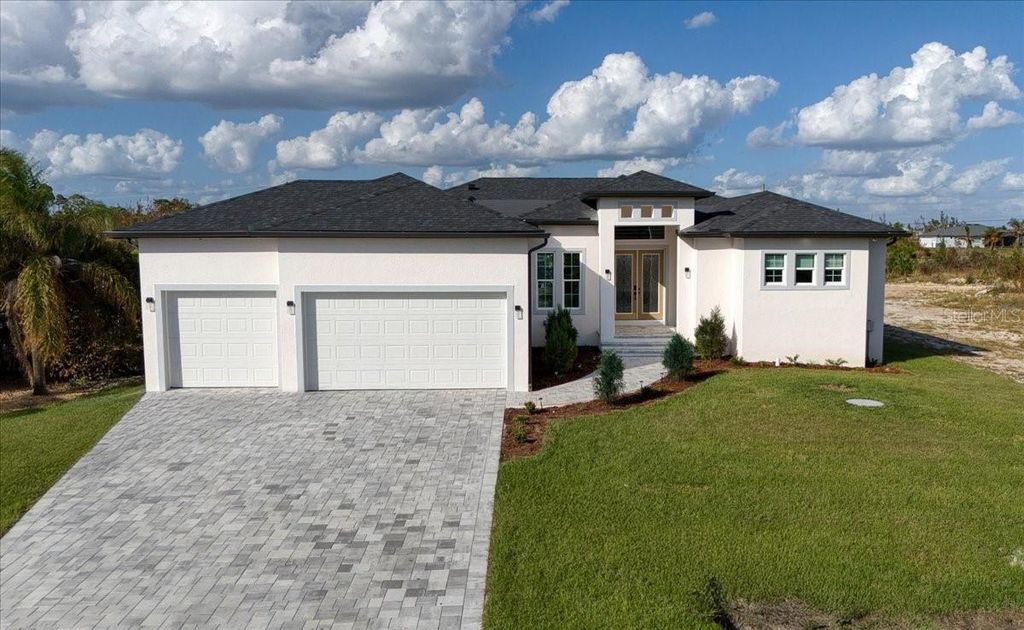 Photo of 15365 Taurus Circle, Port Charlotte, FL 33981 (MLS # C7514406)