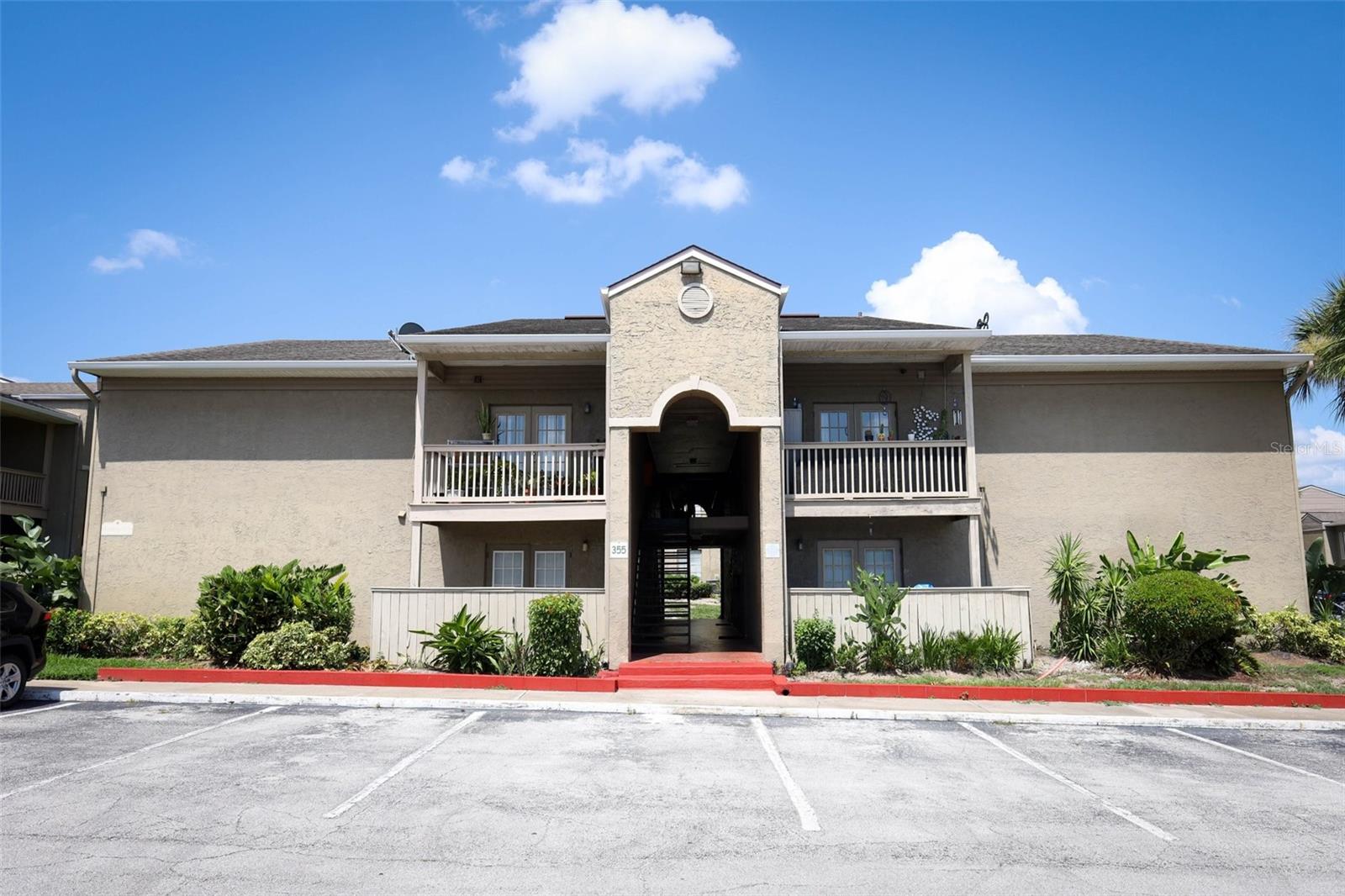 Welcome to this well-maintained 2-bedroom, 1-bath condo located in the sought-after Serravella at Spring Valley community—ideally positioned just off I-4 and SR 436 for unbeatable convenience. This spacious and sun-filled unit features beautiful tile flooring throughout and a thoughtfully designed layout with granite countertops in both the kitchen and bathroom. French doors open to a private balcony, creating a charming space for morning coffee or evening relaxation. Enjoy the ease of in-unit laundry with a dedicated closet that includes a washer and dryer, as well as comfort year-round with a newer A/C unit and ceiling fans in the bedrooms. The Serravella community offers resort-style amenities including a sparkling pool, fully equipped fitness center with heated sauna and locker rooms, indoor racquetball court, tennis courts, full basketball court, clubhouse, rentable party room, and picnic areas with two charcoal grills. Close to premier shopping, dining, and entertainment, this condo offers the perfect balance of lifestyle and location. Don’t miss your chance to live or invest in one of Altamonte Springs’ most convenient and amenity-rich communities!