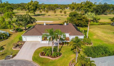 Photo of 4672 Alexander Pope Lane, Sarasota, FL 34241 (MLS # A4672673)