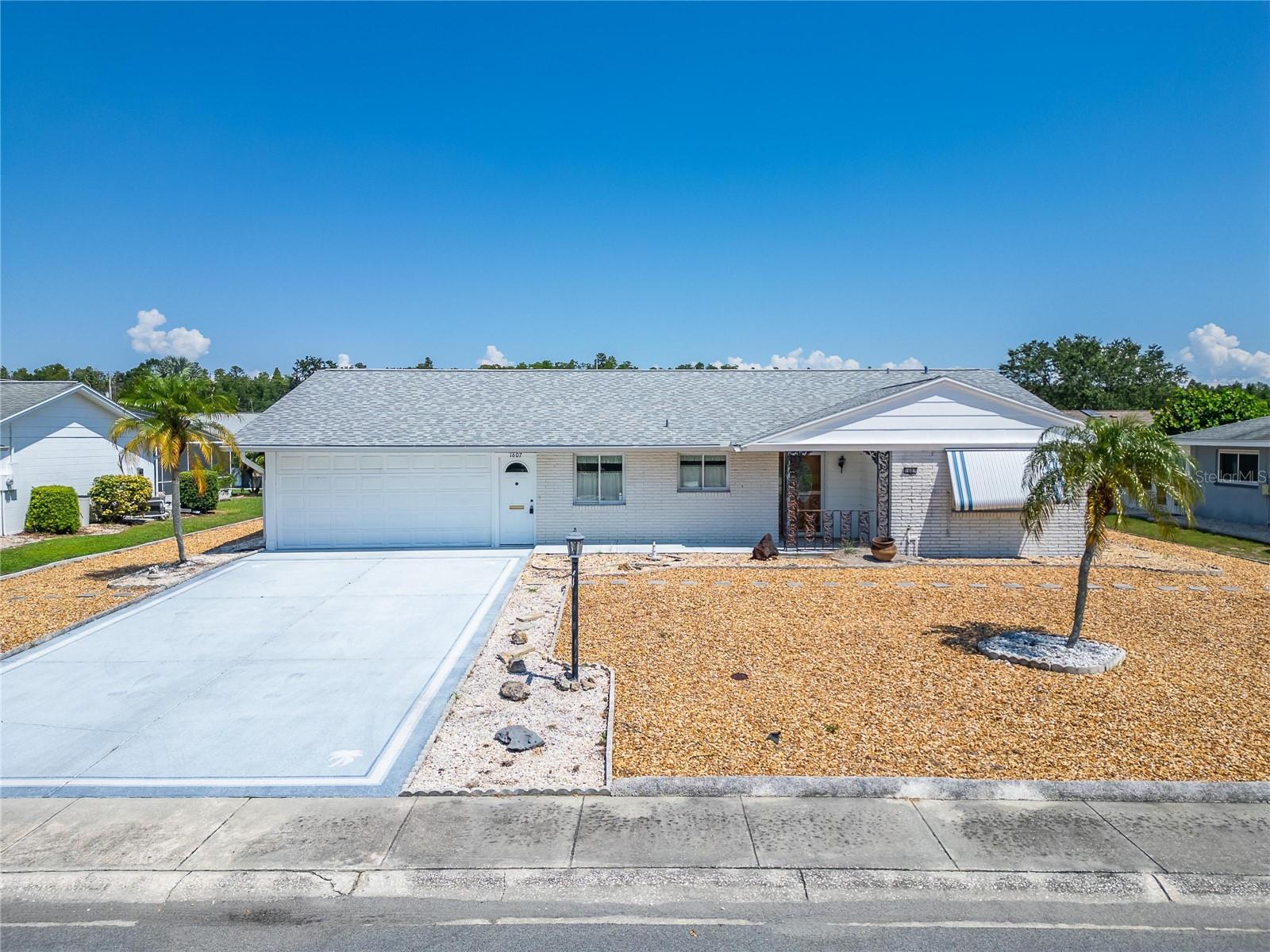 Welcome to this beautifully updated 3-bedroom, 2-bath home designed for comfort, convenience, and low-maintenance living. Major updates include a new roof in 2019, AC in 2016, and updated windows and plumbing—giving you peace of mind for years to come. Inside, you'll love the spacious primary suite with plenty of room for a sitting area or home office, a convenient inside laundry room, and a garage with a sleek epoxy floor. Step outside to a screened lanai perfect for relaxing or entertaining. The maintenance-free yard, thoughtfully landscaped with decorative rock, means you can say goodbye to weekly mowing and enjoy more of your time doing what you love. Located in the heart of Sun City Center, this home gives you access to an incredible 55+ lifestyle with over 200 clubs and activities, two large clubhouses, indoor and outdoor pools, pickleball and tennis courts, shuffleboard, athletic fields, and much more. Whether you're looking to stay active, make new friends, or simply unwind, Sun City Center offers something for everyone. Don’t miss this opportunity—schedule your private showing today!