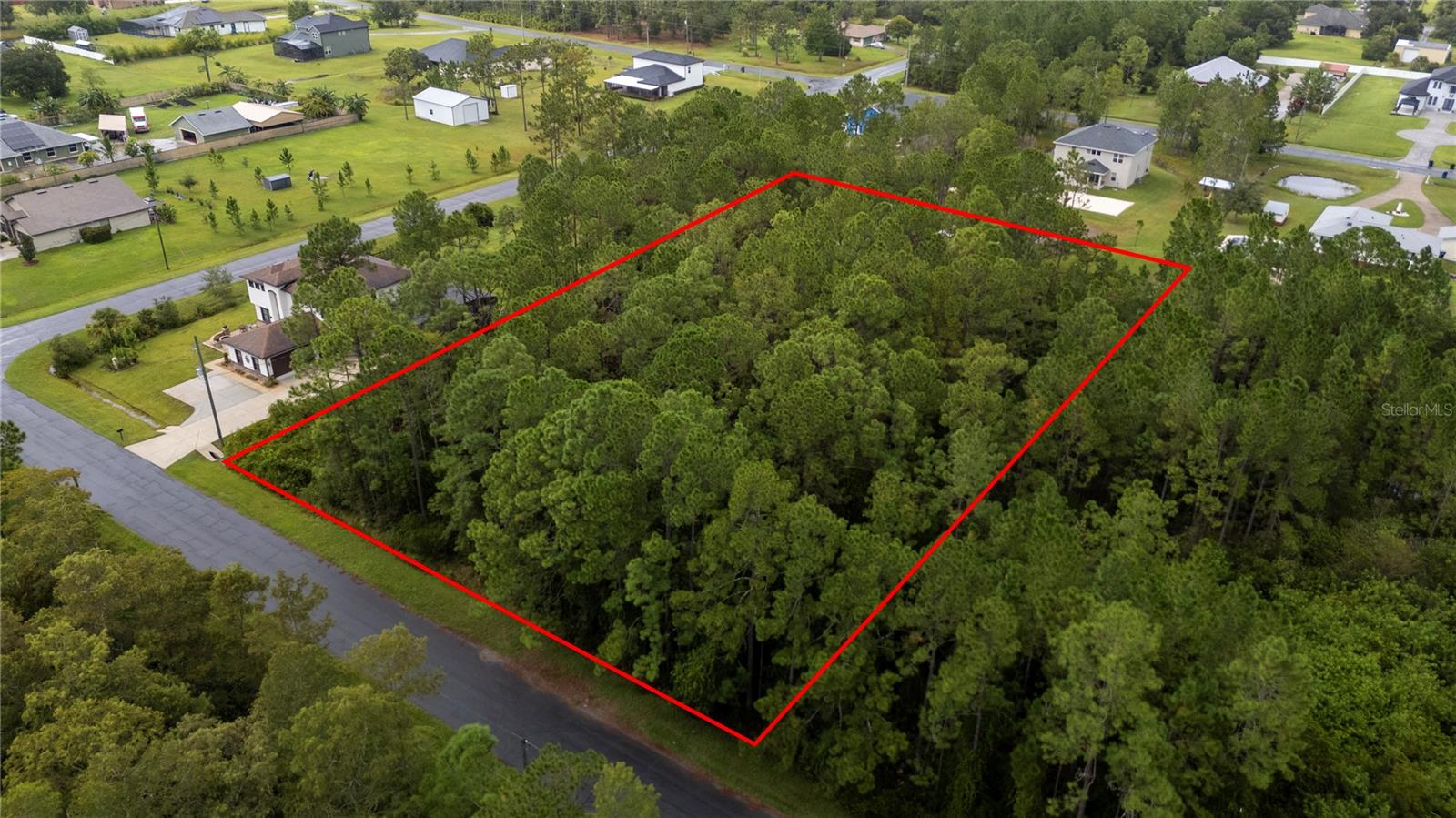 Nestled in a peaceful and quiet area of sought-after Wedgefield, this spacious 1.03-acre vacant lot is ready for your vision. With plenty of room for a custom home, pool, or outdoor living space, this property offers the perfect blend of privacy and convenience. Enjoy the charm of country-style living with easy access to major roads, Orlando Airport, schools, shopping, and the coast. Don’t miss this opportunity to own a slice of Florida paradise-bring your plan and start building.