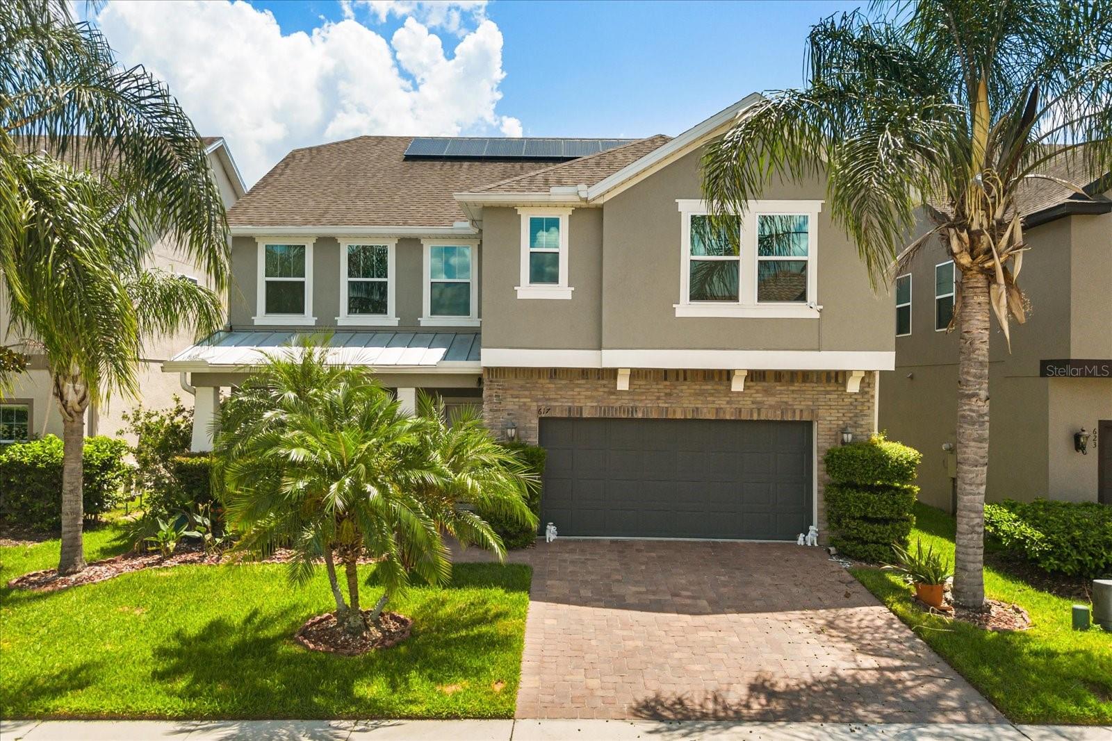 Stunning 5BR/4BA pool home in the highly desirable Johns Lake Pointe community. Built in 2016 by Meritage Homes, this 3,100+ sq ft property is loaded with upgrades and move-in ready. The gourmet kitchen features granite counters, tile backsplash, stainless steel appliances, double ovens, and a walk-in pantry. Downstairs showcases elegant marble and porcelain tile flooring, crown molding, and a flexible layout with a formal living area and a 5th bedroom or office. Upstairs includes wood floors throughout, a spacious loft, laundry room, and all bedrooms with walk-in closets. The luxurious primary suite offers a spa-like bath with soaking tub, dual vanities, separate shower, and custom closet. Enjoy outdoor living with a private screened-in pool, full paver surround, upgraded landscaping, fenced yard, and paid-off solar panels. Additional highlights: paved walkways, fenced backyard, and a 2-car garage. Resort-style amenities include clubhouse, fitness center, pool, tennis courts, and playground. Close to top-rated schools, highways, and Winter Garden Village.