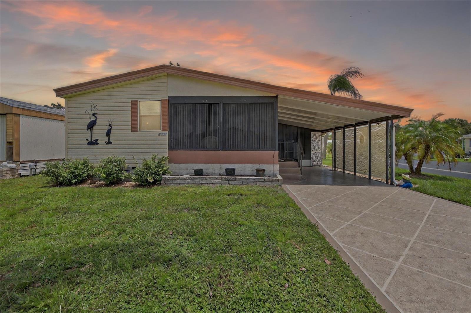 Welcome to your new home in the highly sought-after Terra Siesta Mobile Home Park, a vibrant 55+ community with exceptional amenities. This spacious 2 bedroom, 2 bathroom double-wide mobile home sits on a desirable corner lot and offers a perfect blend of comfort and convenience. Enjoy relaxing evenings in the finished lanai or on the outside screened porch, perfect for entertaining or just enjoying the Florida weather. The home features a covered carport, a separate utility room and comes fully furnished, making it truly move-in ready. Conveniently located just minutes from the interstate, this home offers an easy commute to surrounding areas. You'll also find plenty of shopping, dining and entertainment nearby, any you're just a short drive to some of Florida's most beautiful Gulf Coast beaches. You'll love the active lifestyle in Terra Siesta, with access to 2 community pools, shuffleboard, pickle ball, tennis courts and a welcoming clubhouse with planned activities and events. Best of all, this property is not in a flood zone-no flood insurance required! Don't miss your opportunity to live in one of the desirable 55+ communities around. Schedule your private showing today!