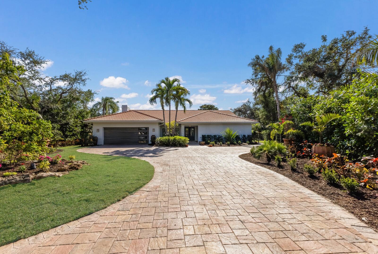 In The Landings, a ‘West of Trail’ 24/7 gated community has a 4 bedroom home that has been superbly renovated to today’s highest standards. It’s the perfect home for a growing family or for entertaining friends or family. With 4 bedrooms, (2 are master bedrooms) and 3 and ½ baths over 3,400 sq ft, privacy is assured.
The kitchen was totally remodeled with new solid wood cabinets, quartz countertops, a composite sink that’s scratch and stain proof, instant hot water, GE induction cook top, GE convection /microwave oven, and a panel ready 42-inch side by side Monogram refrigerator.
All the floors were replaced with engineered ¾ hardwood French Oak. All the windows are hurricane impact and have Plantation shutters. Hot water is never far away from a shower with two new tankless water heaters.
The primary master bath has two new vanities and two walk-in closets, one is 12 by 12.
All rooms have high ceilings with the family room having vaulted ceilings and a wood burning fireplace.
These improvements complement the redesigned outside with a completely new saltwater pool with a sun shelf, water jets and an oversized heater.
Extensive landscaping was installed, and the turf is just waiting for a golfer to put in a few holes. The night lighting is perfect with a look reminiscent of a resort vibe.
There is a whole house water purification system, and the garage door is new.
The roof was new in 2016 and the two a/c’s were new in 2024.
Optional membership is available at The Landings Racquet Club, which offers an active tennis program with 8 clay courts, a heated Olympic-sized swimming pool, a fitness room, and social activities. There is a kayak launch and a fishing pier on the bay.
The Landings itself is over 300 acres of lush landscaping and winding oak canopied roads.
All this is located just a few miles south of downtown Sarasota and a short drive to the famous Siesta Key Beach.
Make plans to view this home today so you can picture yourself enjoying the Florida lifestyle tomorrow.